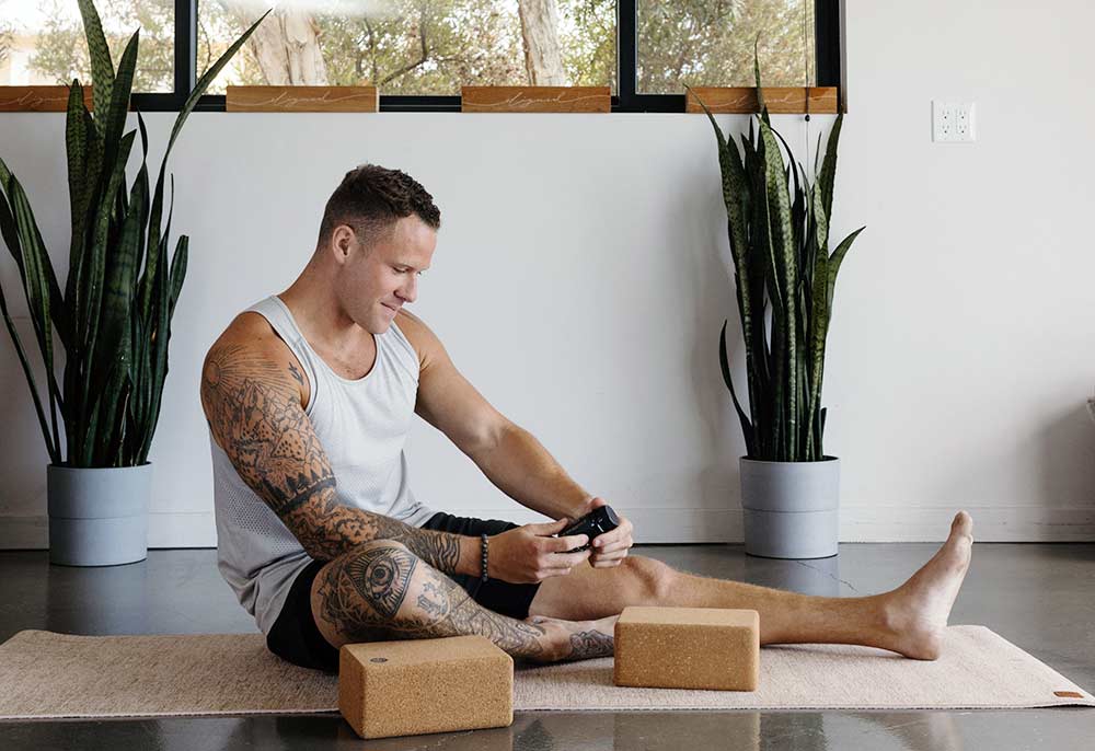 Man holding raw botanics product